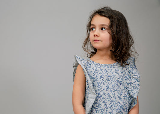 Top with ruffles and twig print