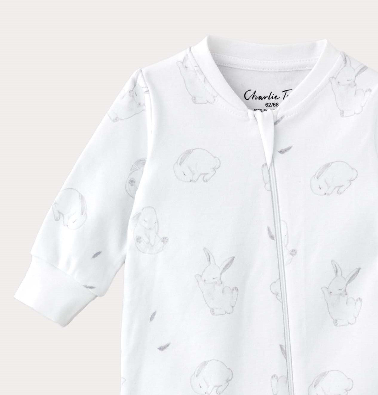Pyjamas med fot för baby i ekologisk bomull med kaniner