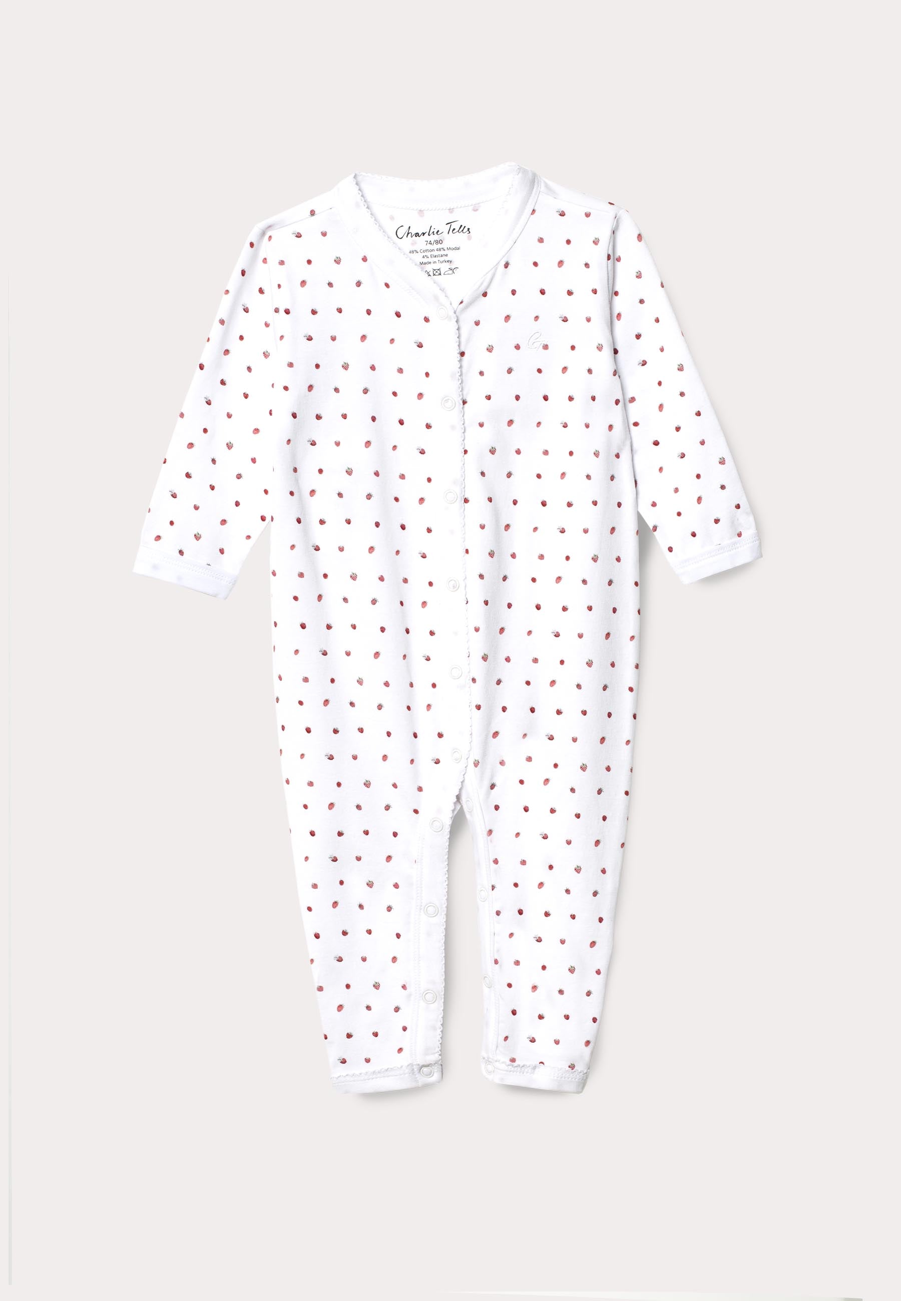 Pyjamas för baby med broderi och smultron
