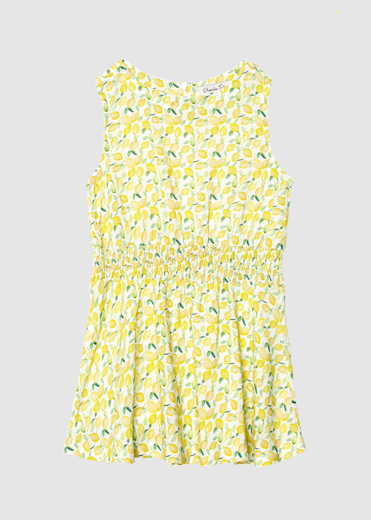 Klänning med smock och citronprint