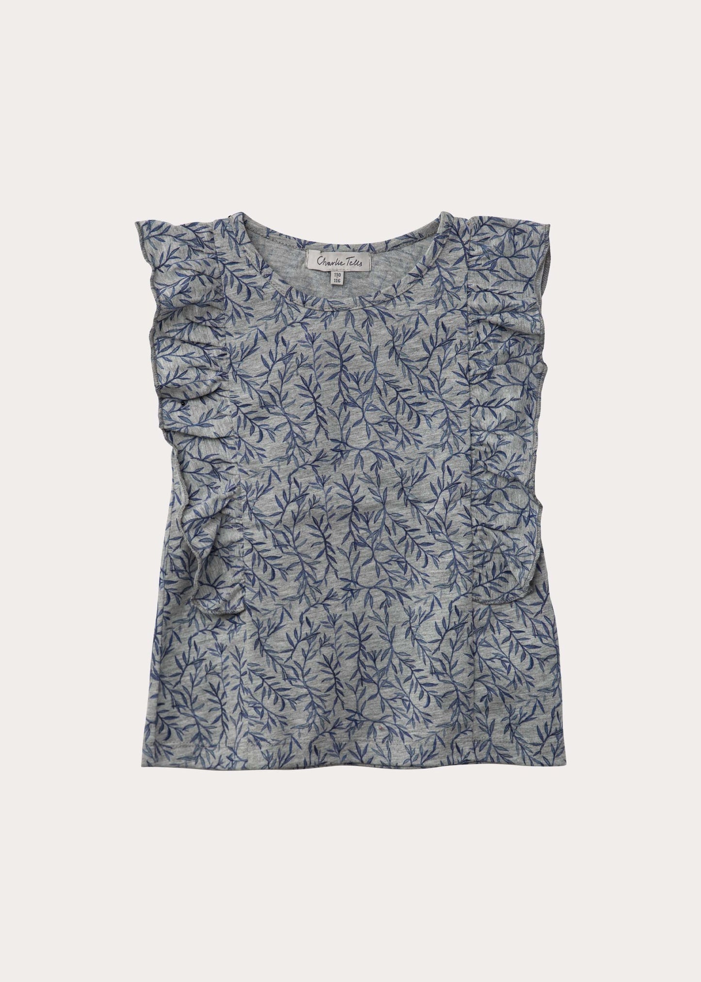 Top with ruffles and twig print