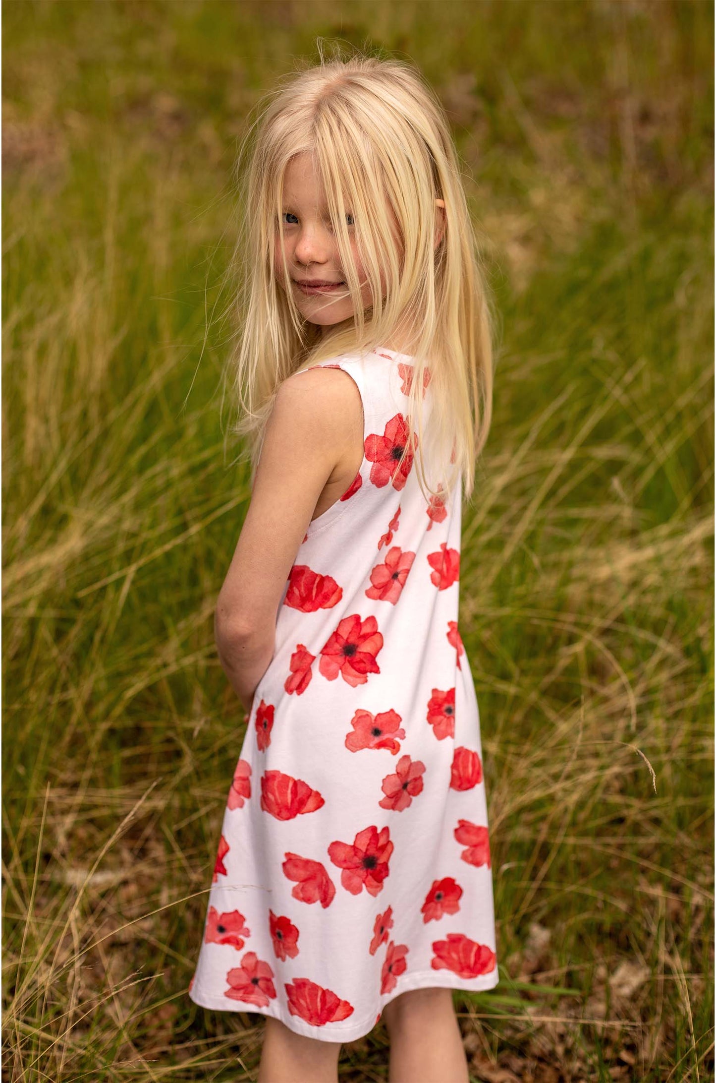 A-linjeformad klänning med vallmoprint klänning