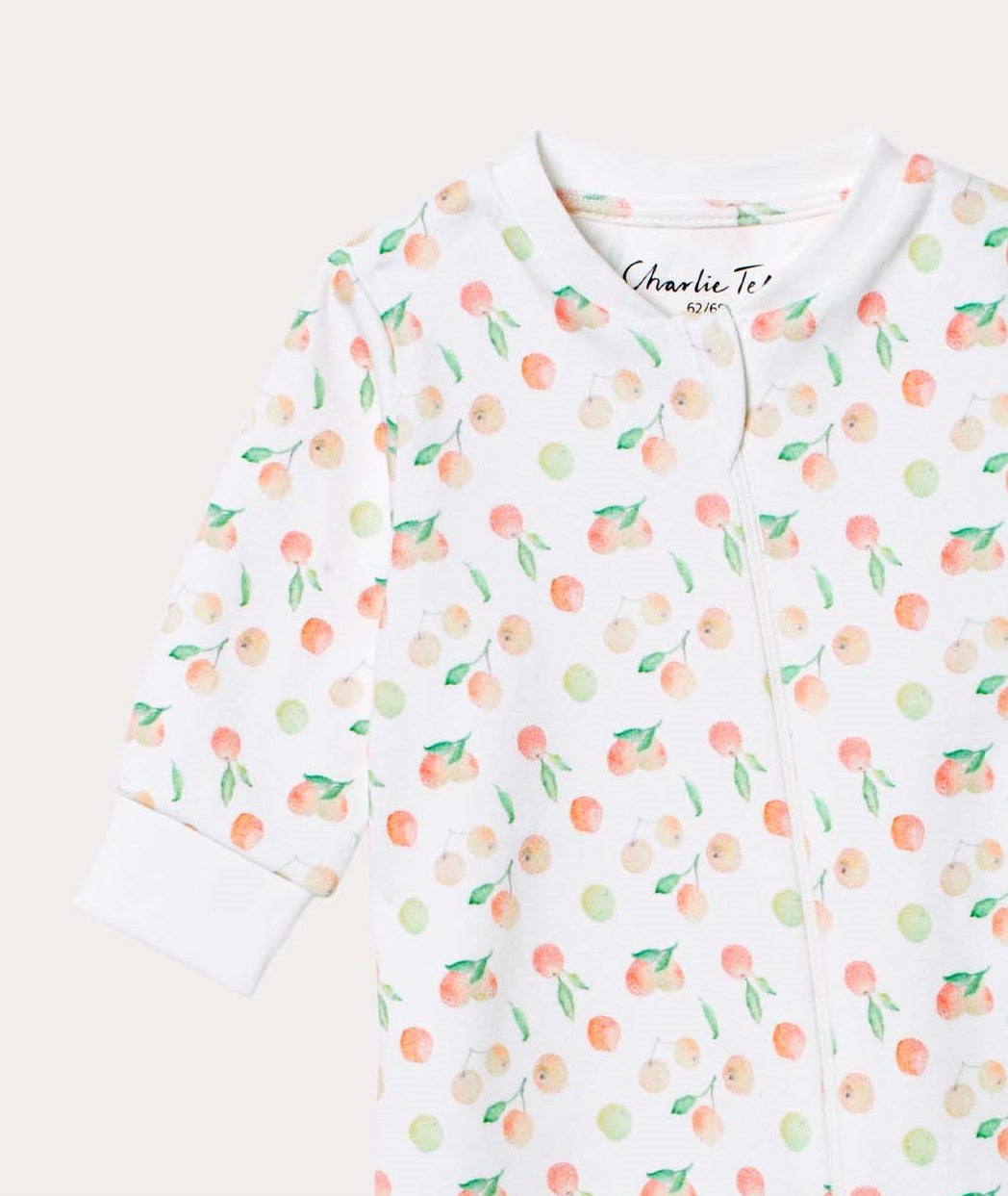 Pyjamas med fot för baby i ekologisk bomull med äpplen Pyjamas baby